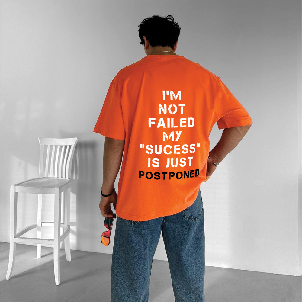 Orange "Postponed" Printed Over size T-Shirt