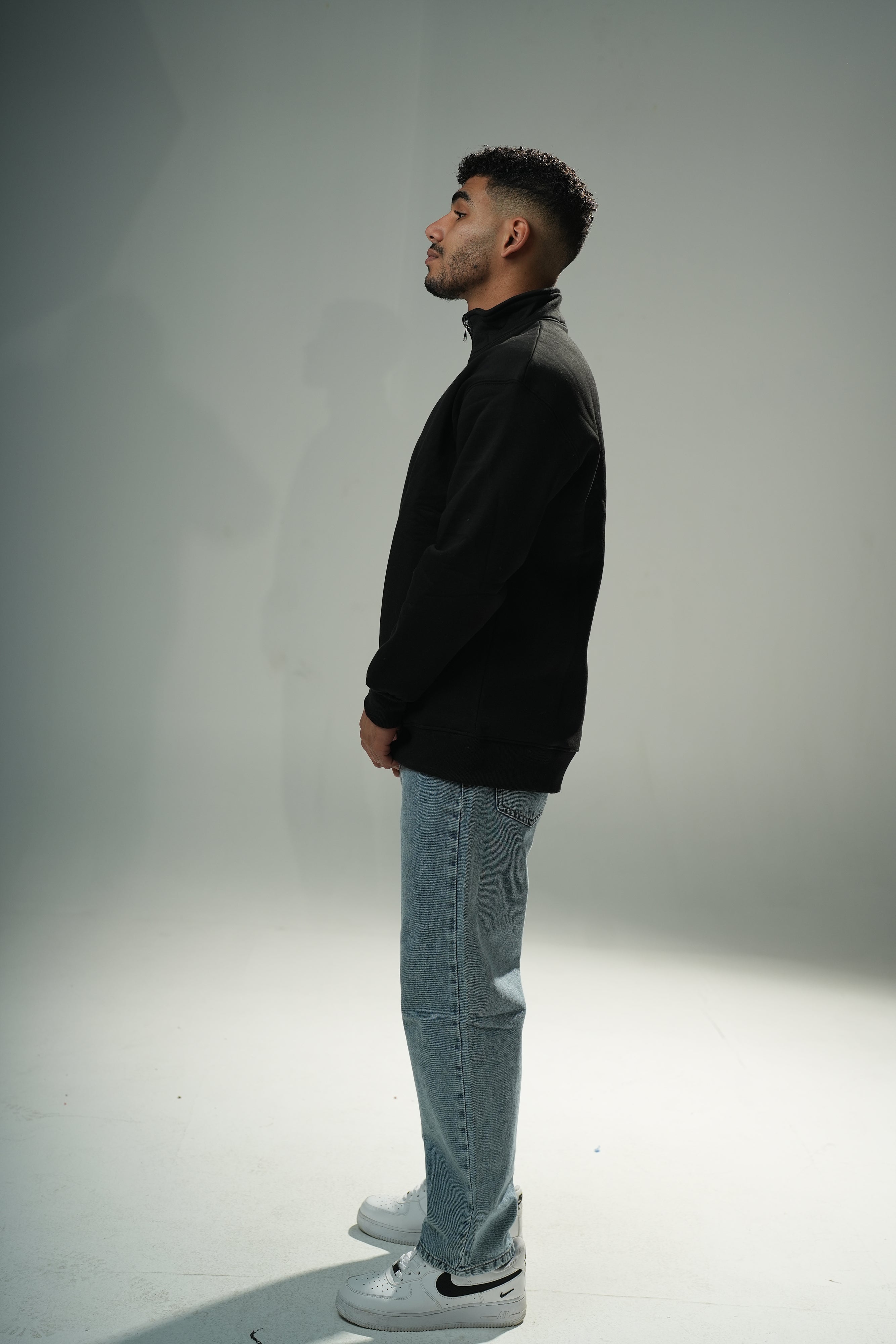 Black Quarter-zip sweater