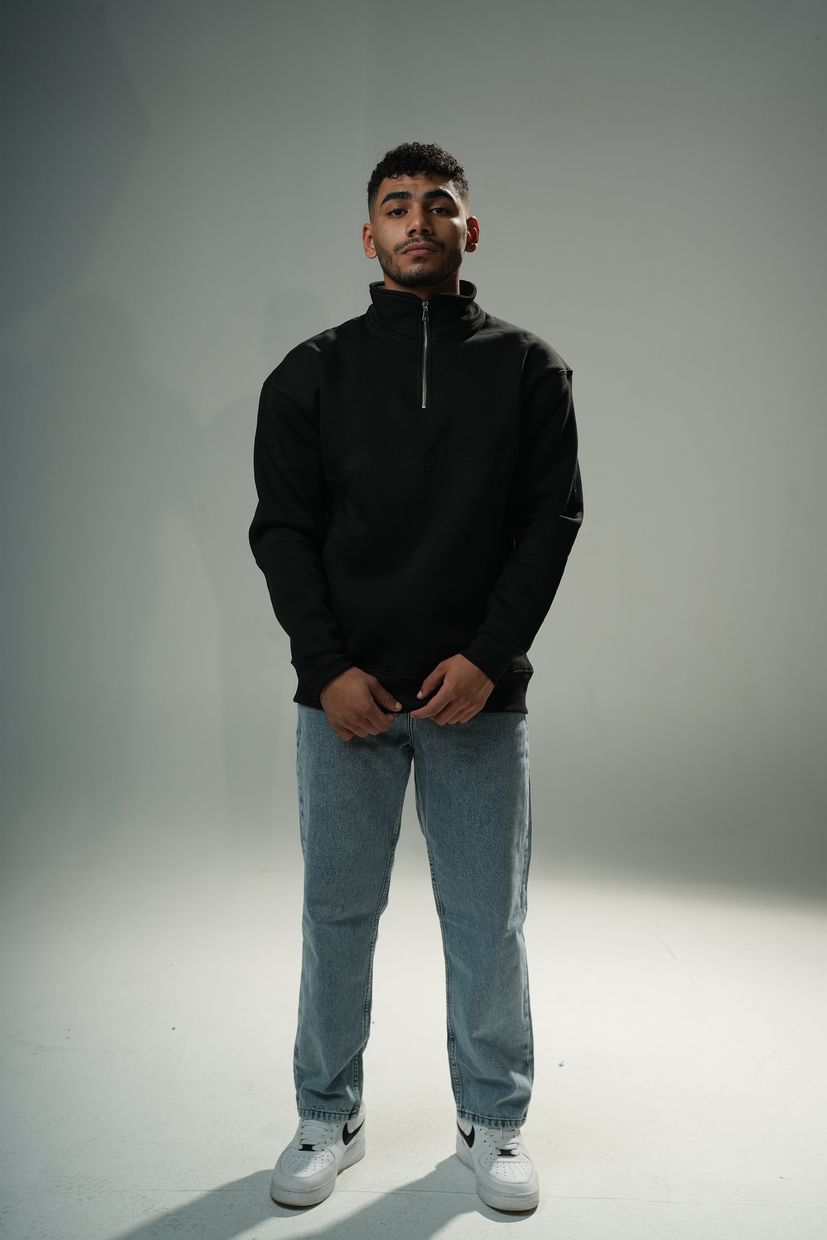 Black Quarter-zip sweater