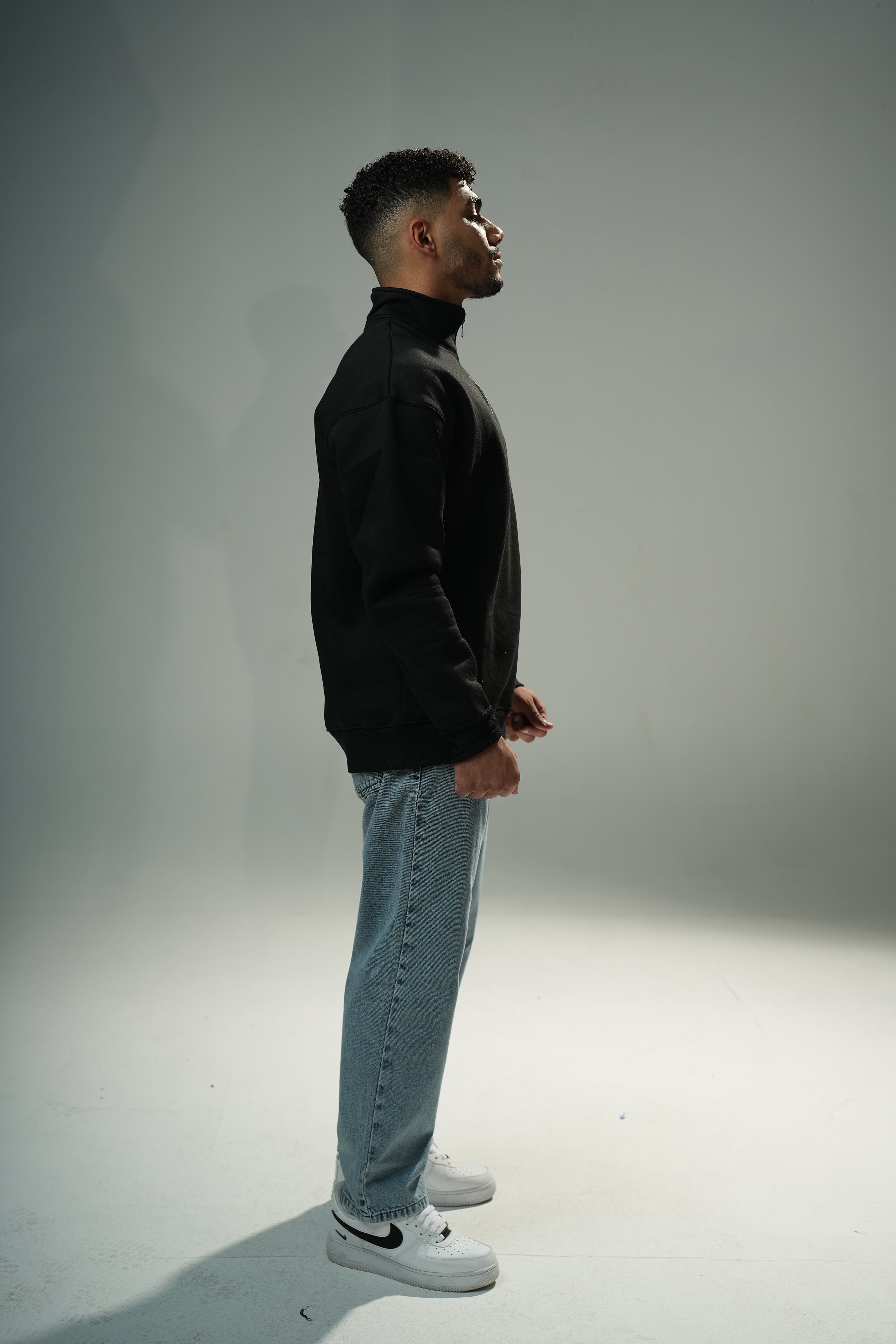 Black Quarter-zip sweater