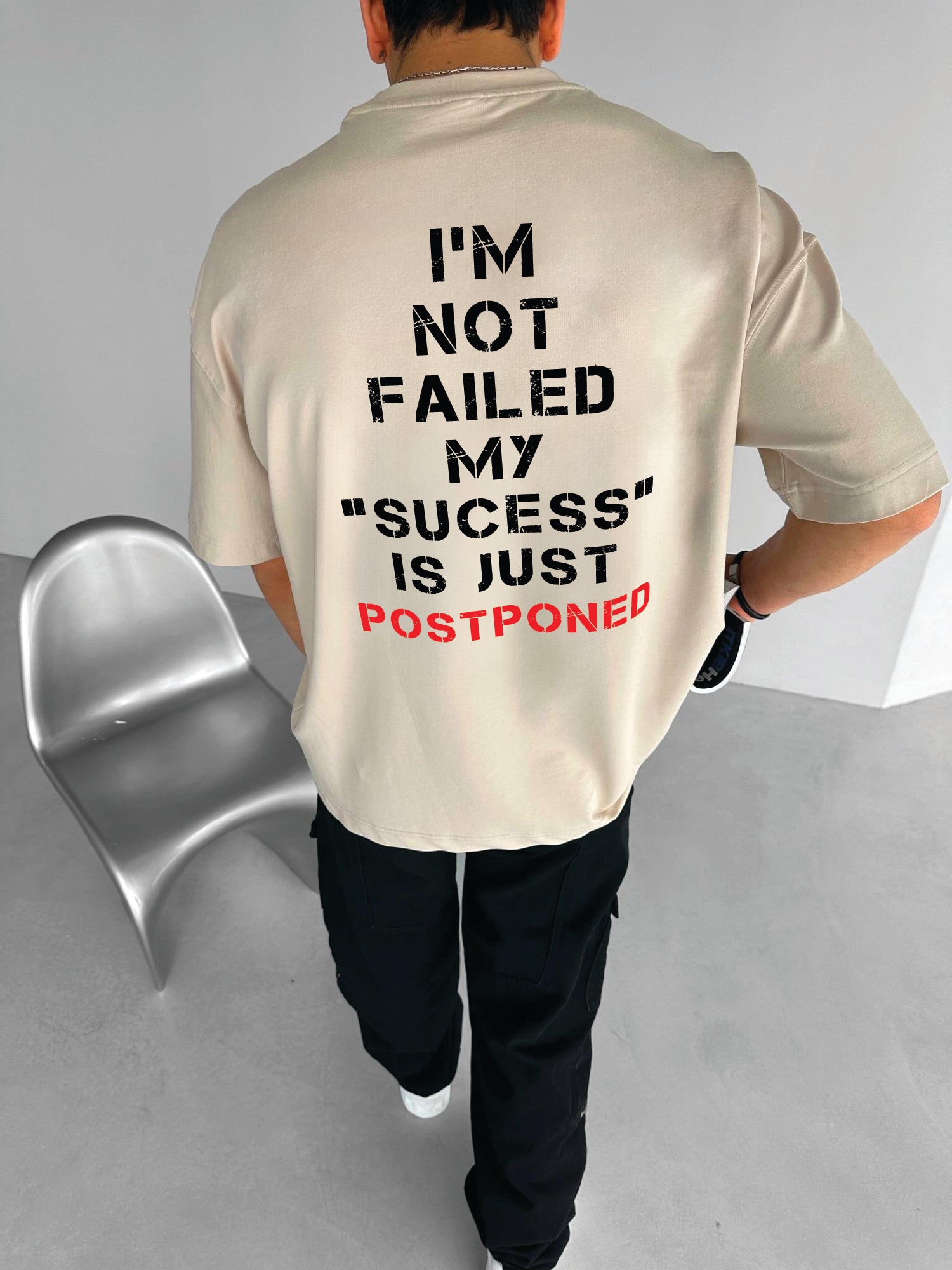 Beige "Postponed" Printed Over size T-Shirt